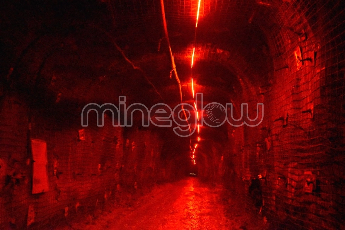 X-Glo LED Emergency Lighting providing direction out of an underground tunnel.