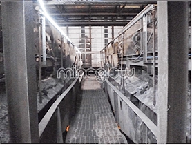 x-Glo LED strip lighting lights up walkway through industrial warehouse