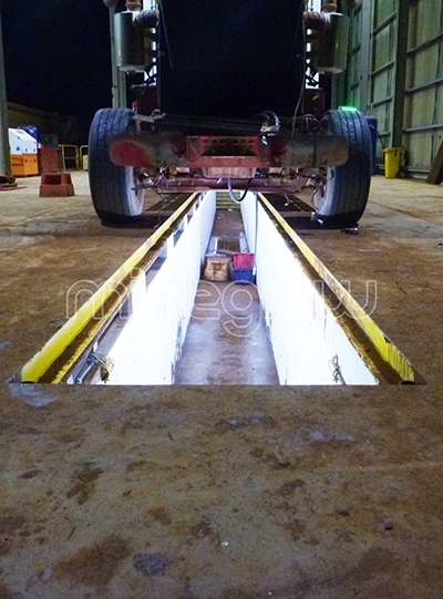 x-Glo LED strip lighting lighting up an industrial service pit