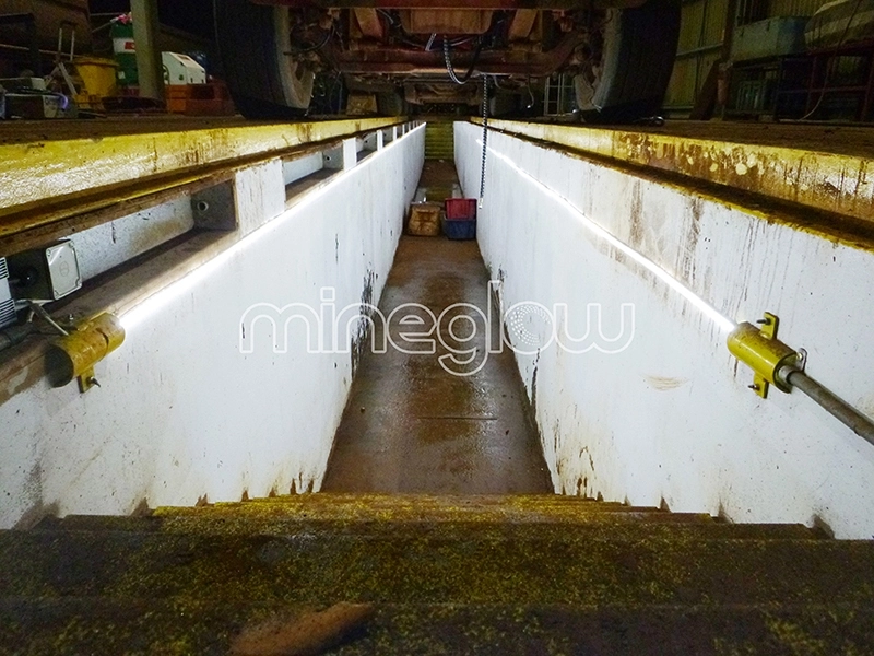 x-Glo LED strip lighting illuminating a service pit
