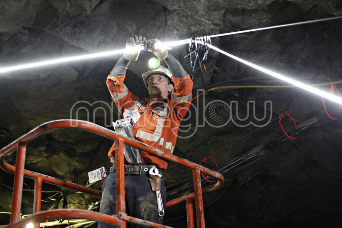 Installing the x-Glo LED Strip Light in an underground mining tunnel