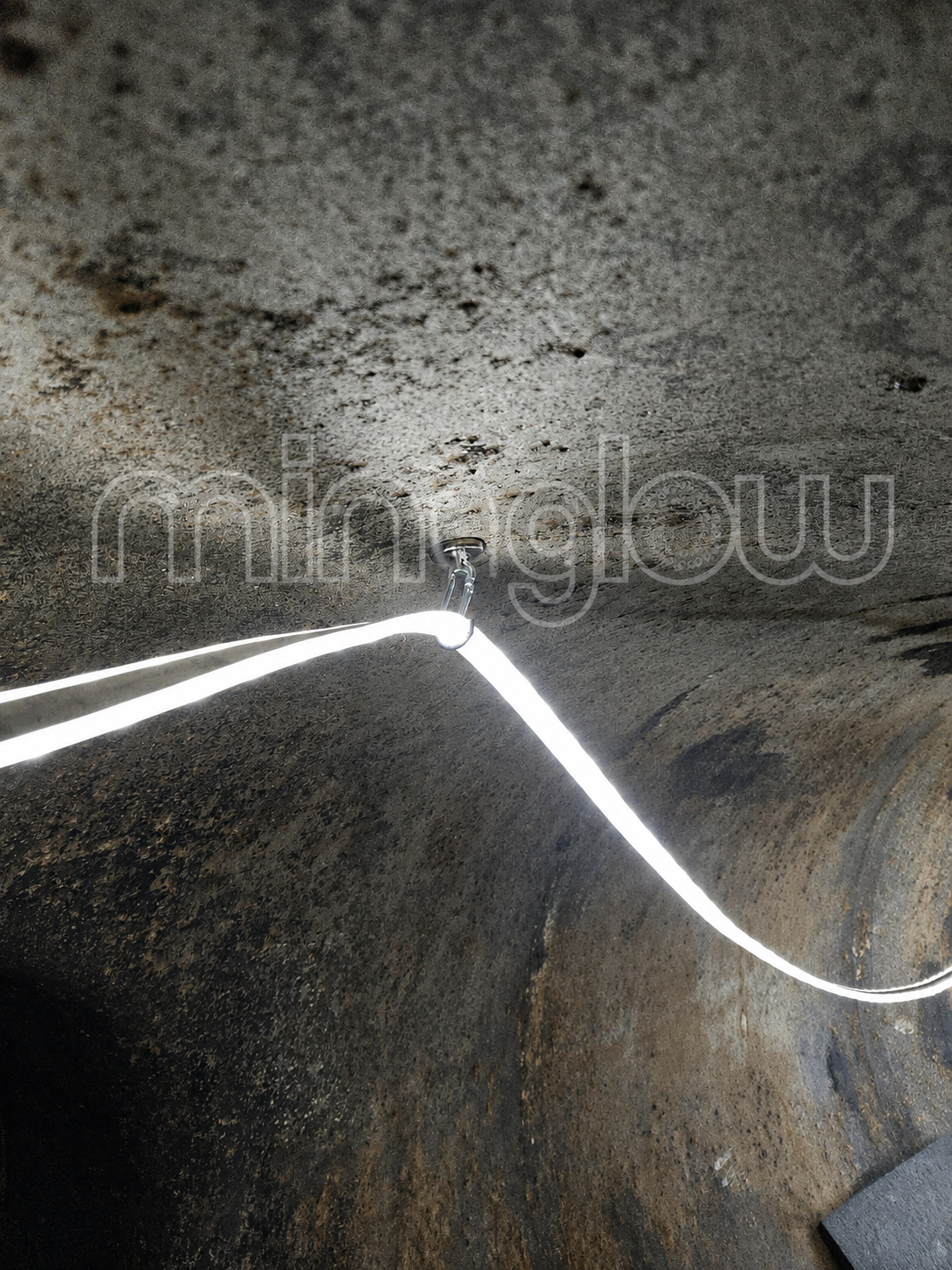 Demonstrating how to easily string up LED Srtip lighting for maintenance of a water tunnel.