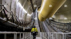 Mineglow LED strip lighting illuminating a hydro tunnel construction project, providing continuous lighting to improve visibility, worker safety and construction efficiency.